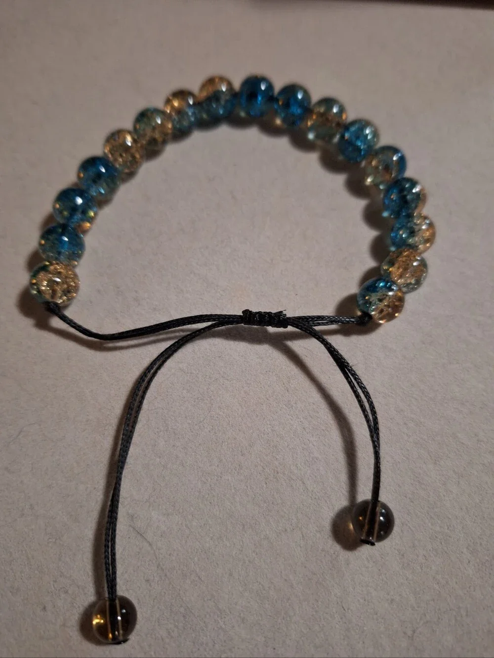Adjustable Blue and Gold Beaded Bracelet